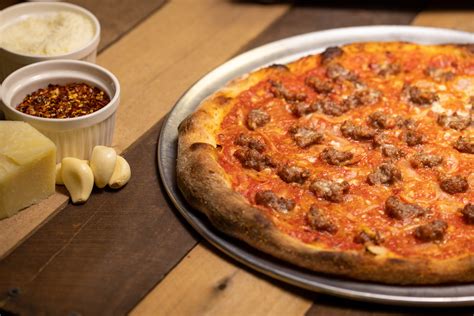 Zuppardis apizza - This pizza is a zuppardi's classic anthony's original special is a red pizza topped with mozzarella&comma; mushroom and zuppardi's homemade fennel sausage Traditional Plain Pie $7.50+ 